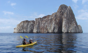 Galapagos Sea Kayaking with Kicker Rock in background off San Cristobal Island