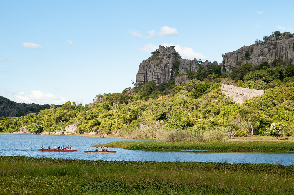 Canoeing across lake at Ankarana Tsingy Iharana Bush Camp