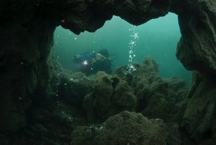 From inside a cave Kleifarvatn Lake Iceland