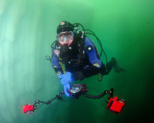 Underwater photographer in Antarctica