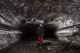 two-cavers-shining-on-ceiling-leidarendi-by-anders-nyberg-iceland.jpg