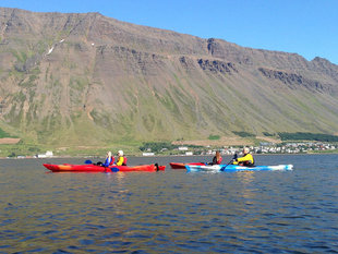 kayakers-calm-water-north-iceland-summer.jpg