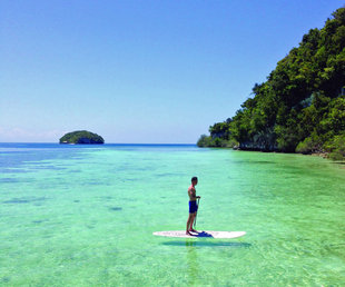 Stand-Up Paddleboarding at Kri Island, Raja Ampat