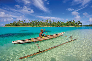 Traditional outrigger canoe in Papua New Guinea