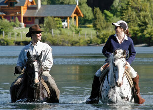 Riding through shallow lake in Bariloche