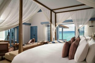 Overwater Villa Bedroom - Raffles Maldives Meradhoo
