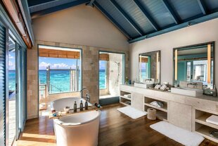 Sunset Overwater Villa Bathroom - Raffles Maldives Meradhoo
