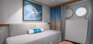 Category D Porthole Cabin, Ocean Victory