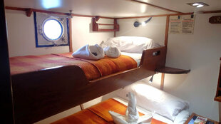 Samba bunked twin port hole cabin