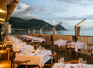 Sunset dining overlooking mountains & Caribbean Sea