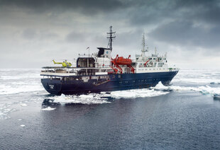 Ortelius with Helicopter in the Ross Sea