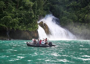 Group Witnessing a Waterfall