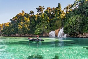 Waterfall and Crystal Clear Waters of Papua