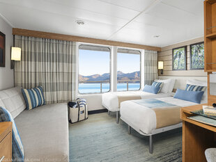 The Interior of a Category 5 Cabin with a Private Balcony