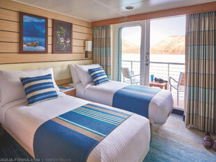 A Category 4 Cabin's Interior with a Private Balcony