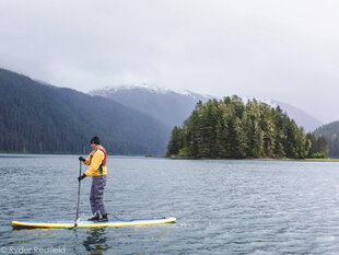 Paddleboarding in the fjords of Alaska