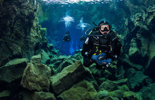 Divers exploring Silfra Fissure