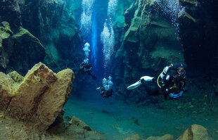 Divers in Silfra Fissure