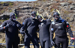 Snorkellers in their dry suits