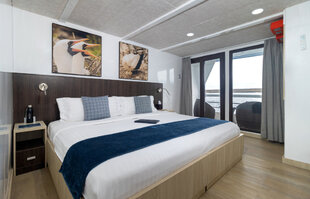 natural-paradise-jr-suite-upper-deck-galapagos-yacht.jpg