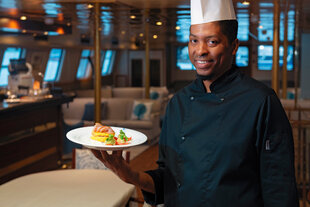 Meals prepared by the onboard chef are served daily
