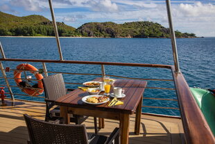 Dining on M/Y Pegasos with views of the Seychelles