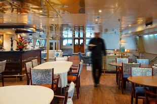 The main indoor dining area of M/Y Pegasos